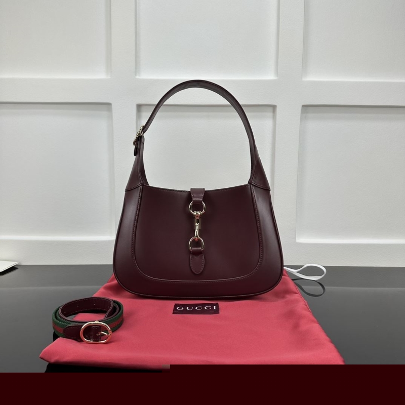 G*u*i top handle bags